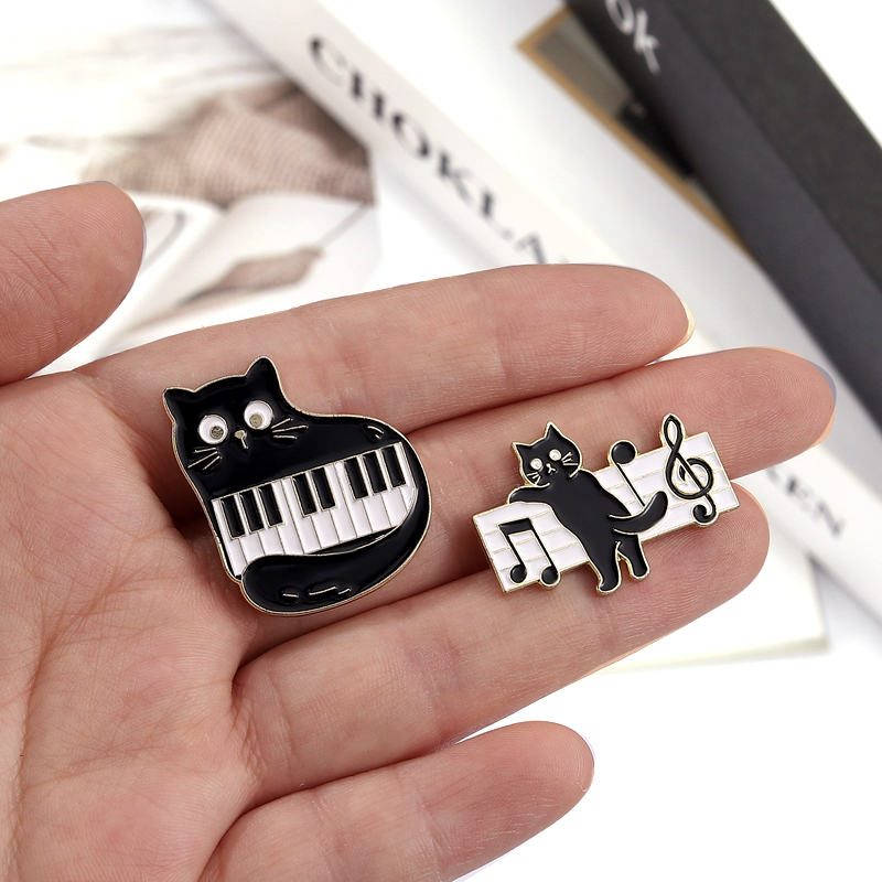 Black Cat with Piano Keys Enam - Musical Instrument Jewelry ulasan dan harga